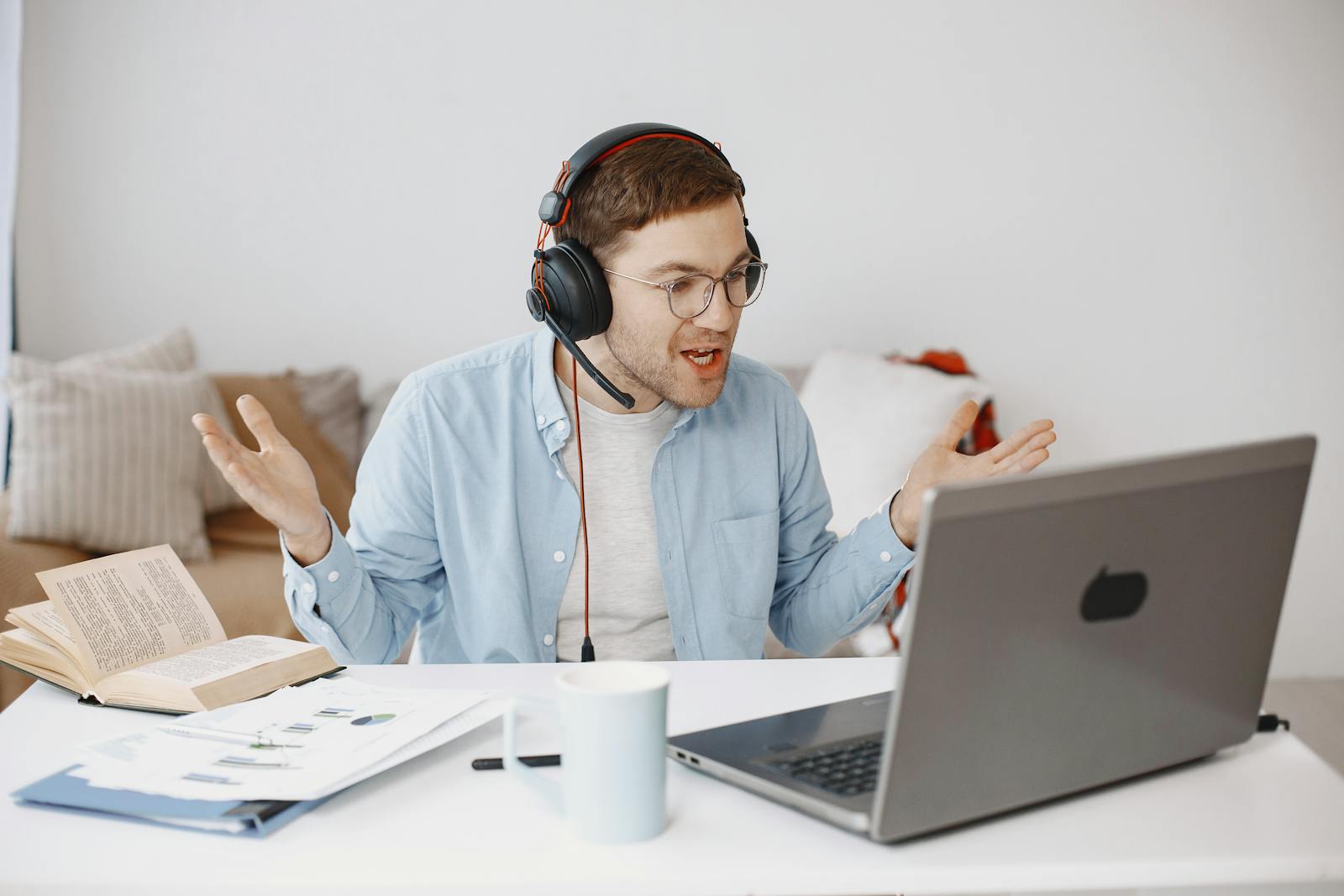 Contractor at a desk reacting to lead generation costs on his laptop
