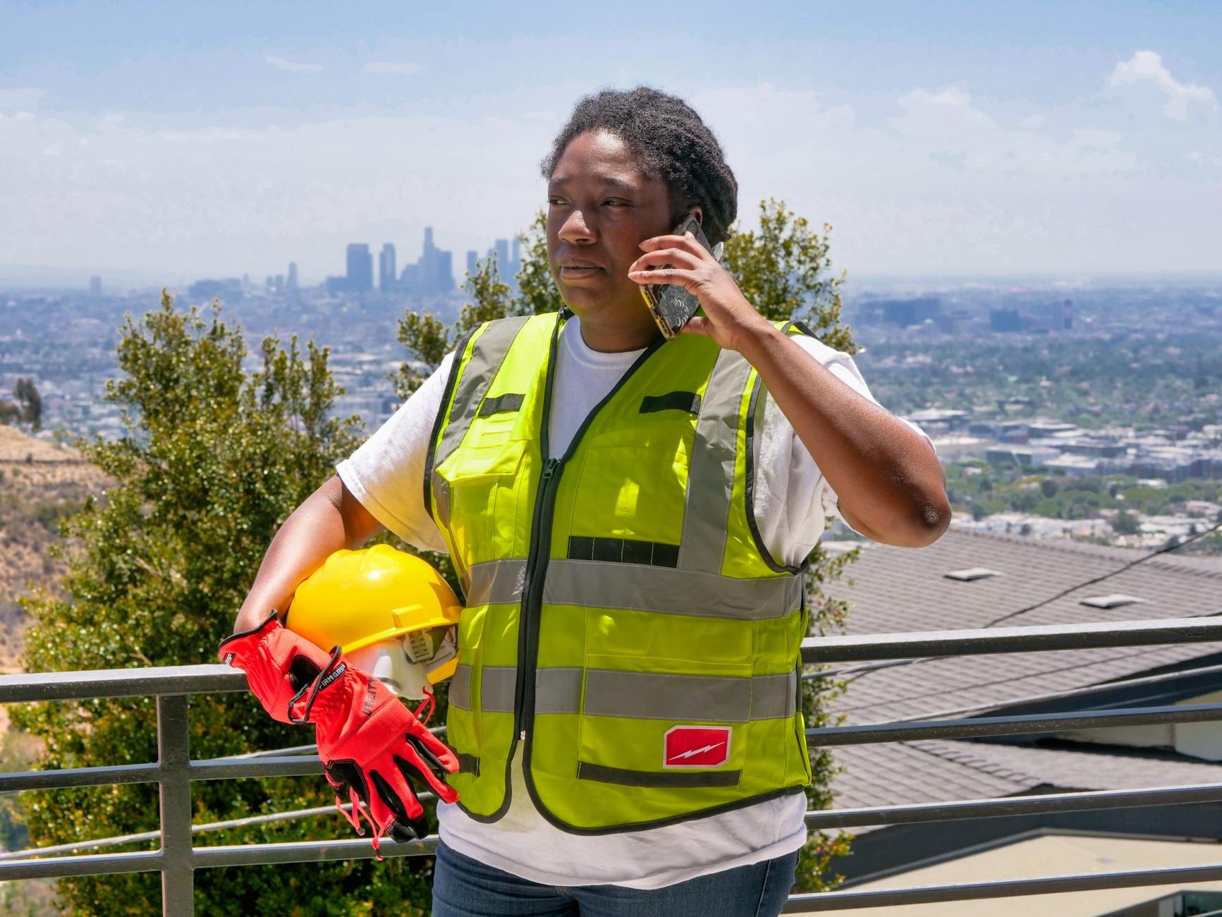 Roofing contractor on the phone with a customer lead