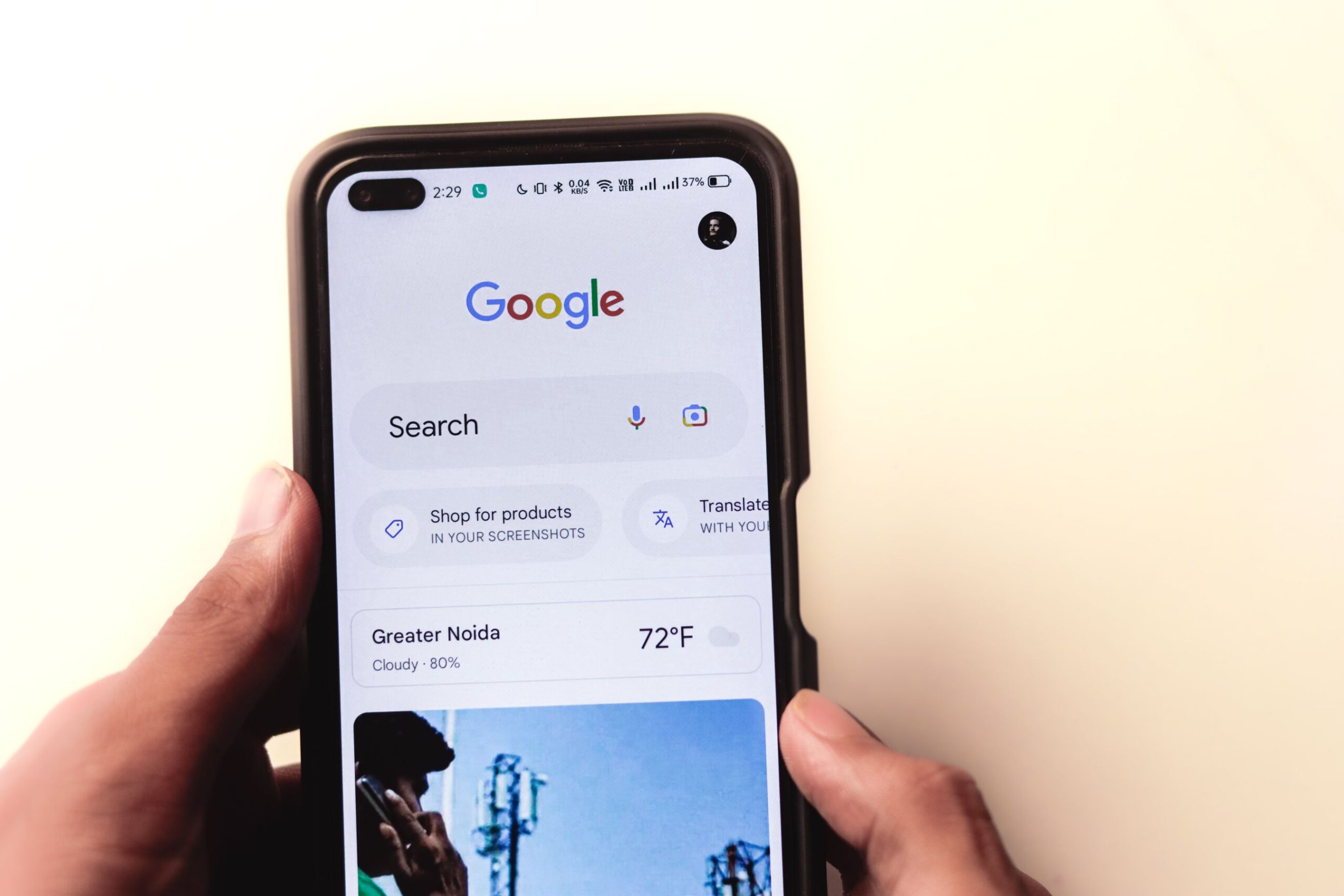A customer searching Google on a mobile phone for a local contractor