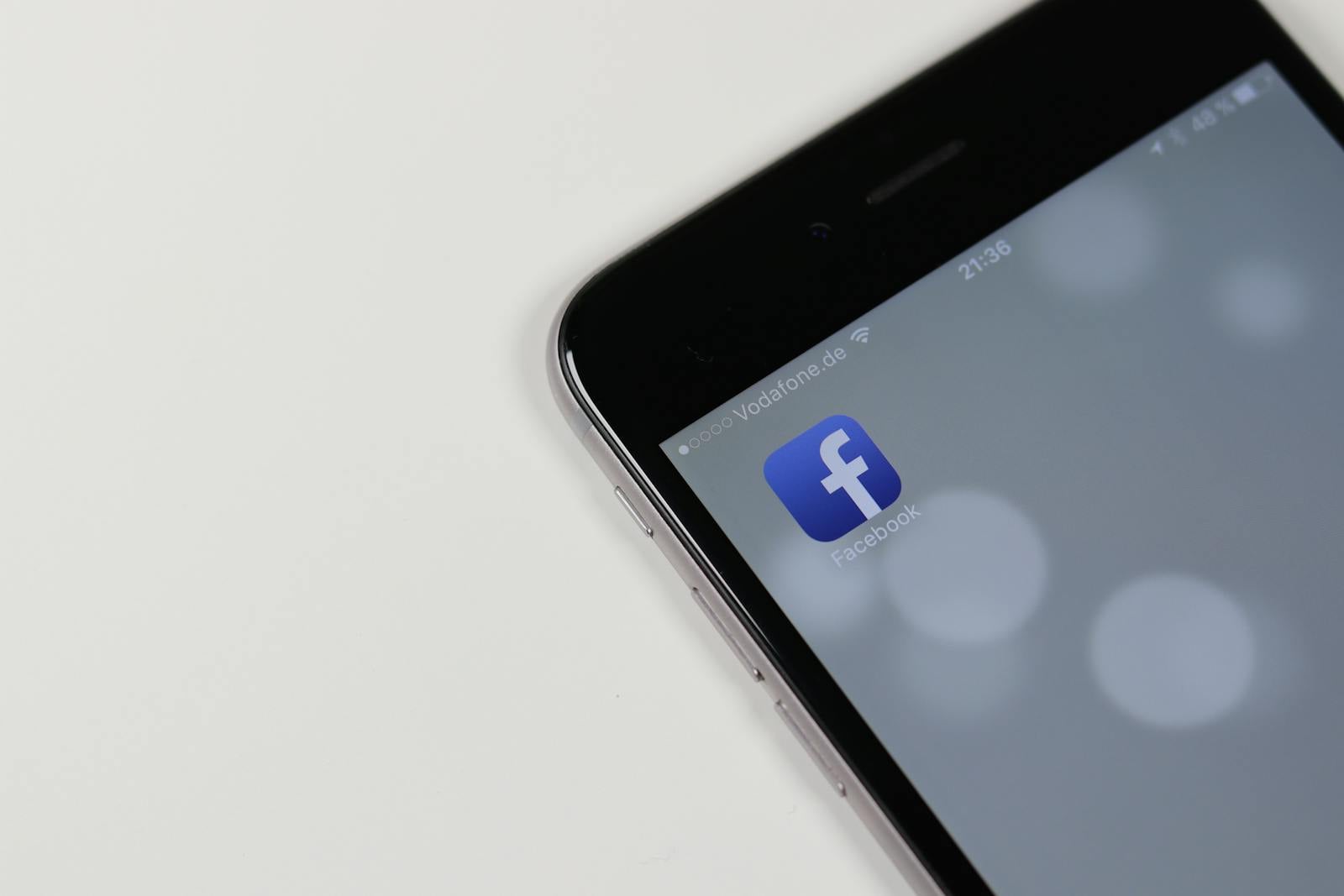 iPhone displaying the Facebook app icon on the home screen