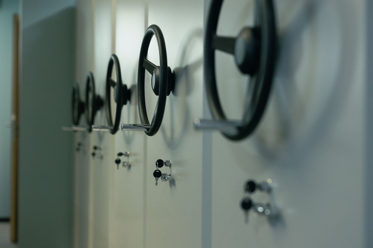 Industrial safes with manual locks and keys highlighting commercial locksmith work