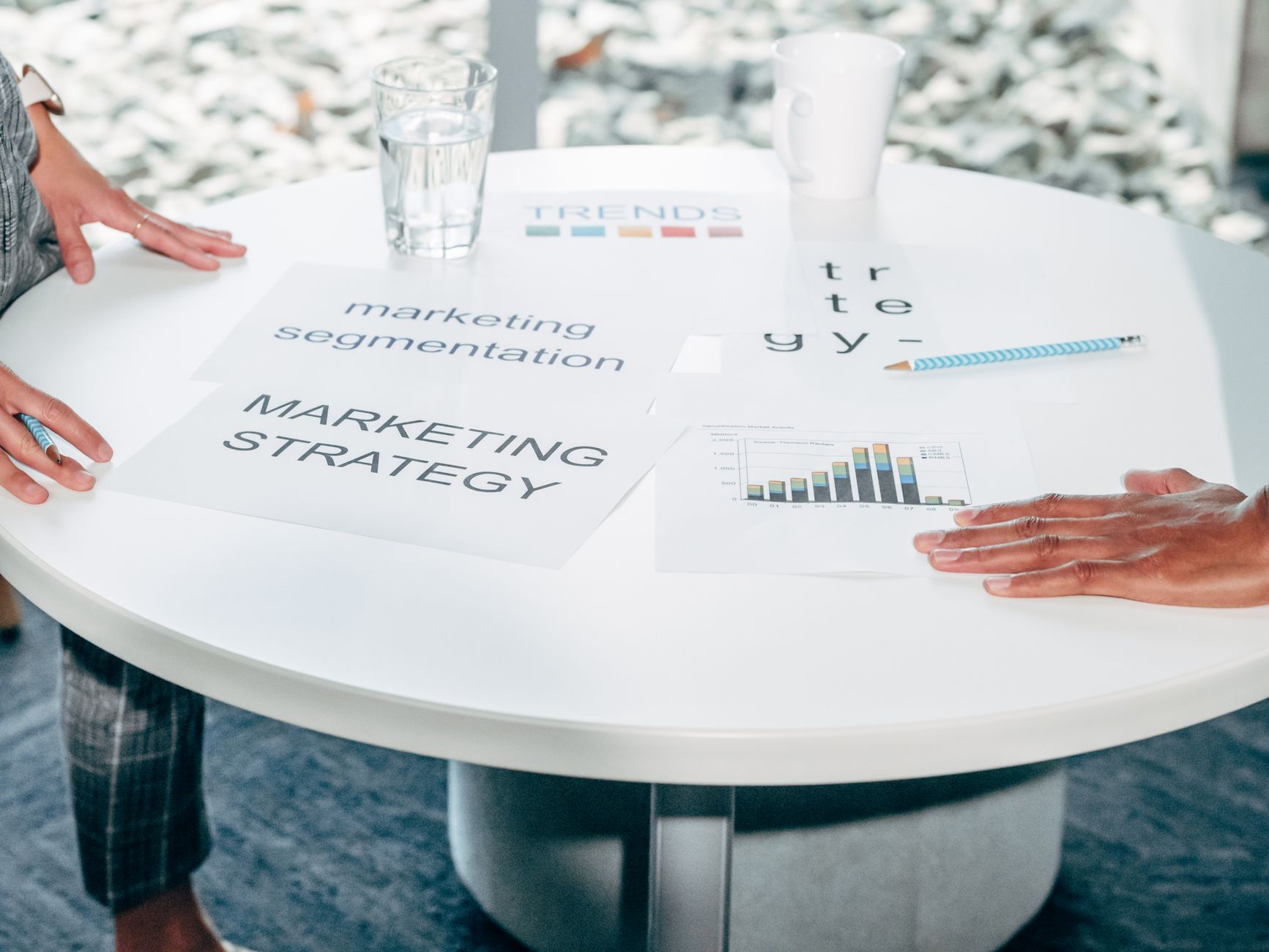 Marketing strategy planning documents on a meeting room table