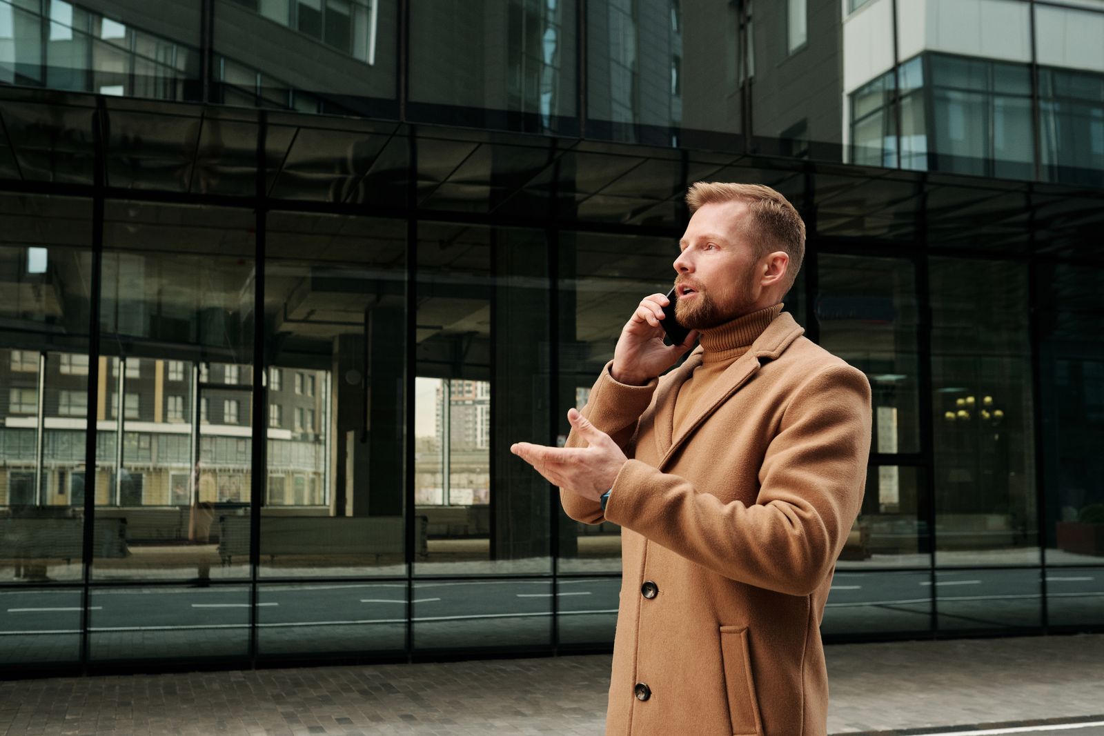 Business owner taking a call from a qualified pool installation lead generated through SEO