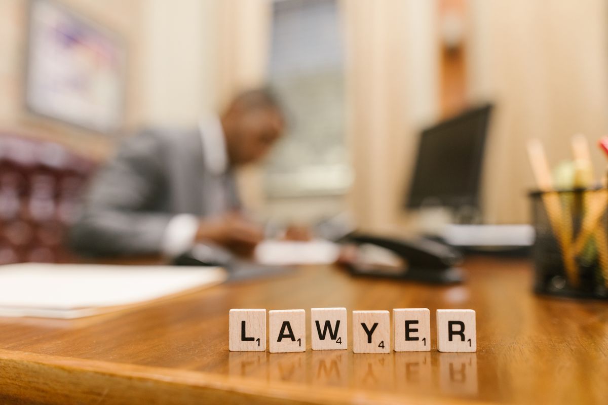 Attorney working at a desk in a professional law office