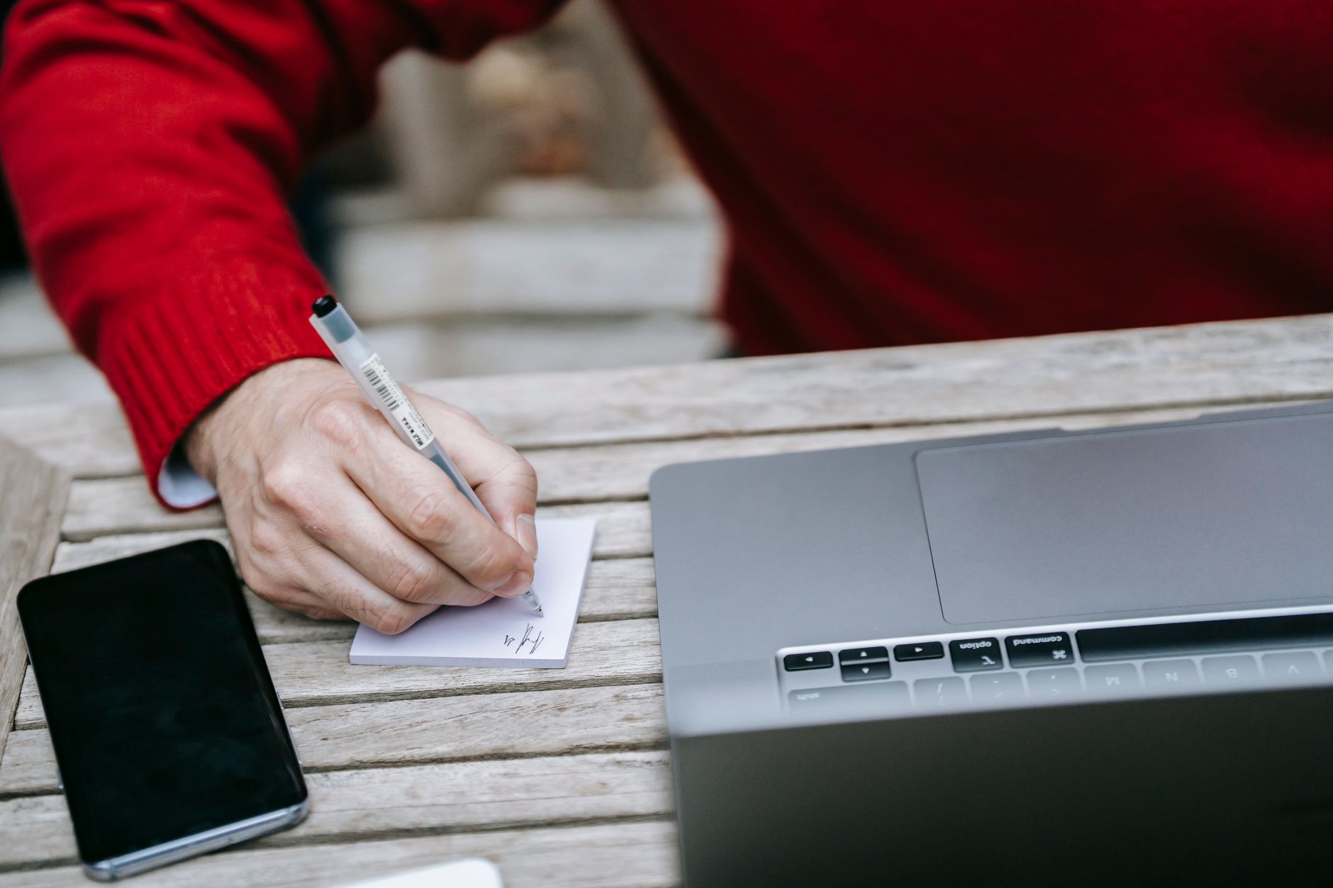 A small business owner drafting a blog post from their content calendar