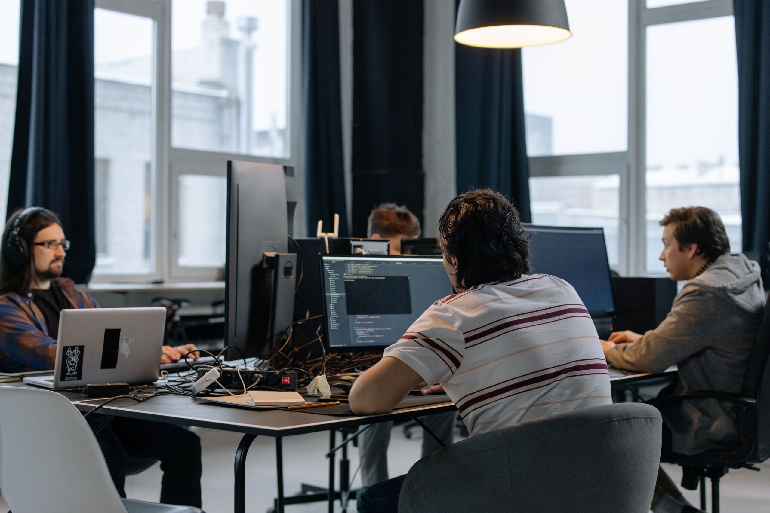 Team creating consistent website content to help a site rank on Google