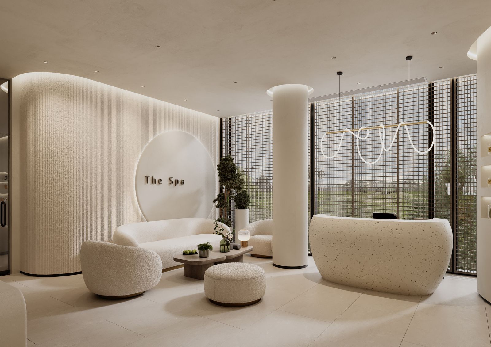 Clean modern med spa reception with curved white seating and terrazzo desk