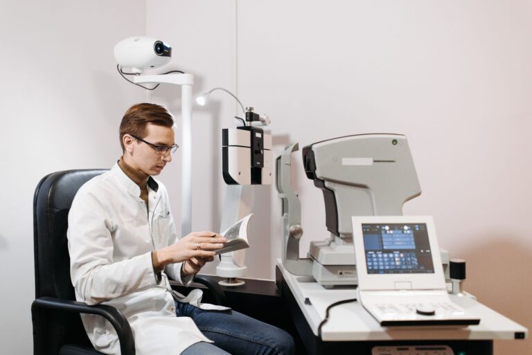 Optometrist performing an eye exam in a modern vision clinic