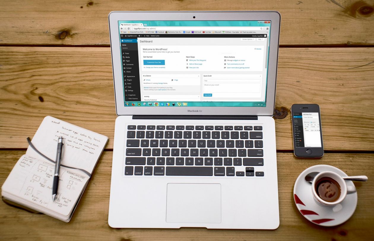 Home office setup with laptop notebook and smartphone for content marketing work
