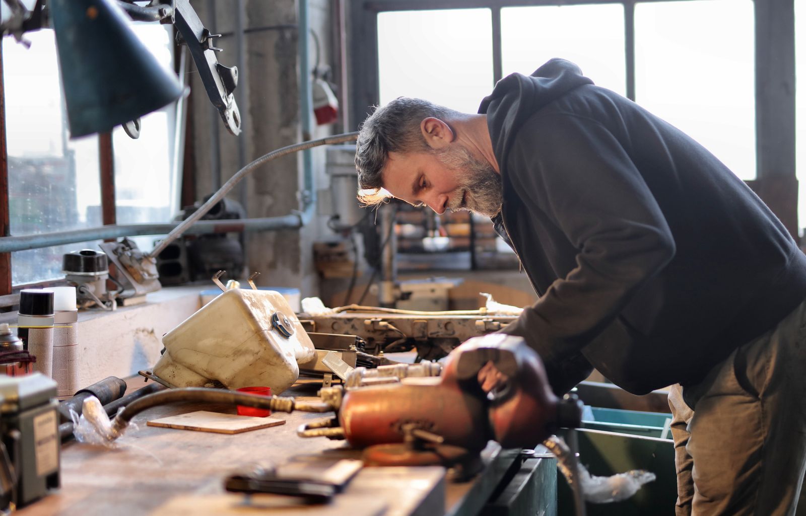 Tradesperson craftsman working in service business — the type of local business that benefits most from SEO ROI