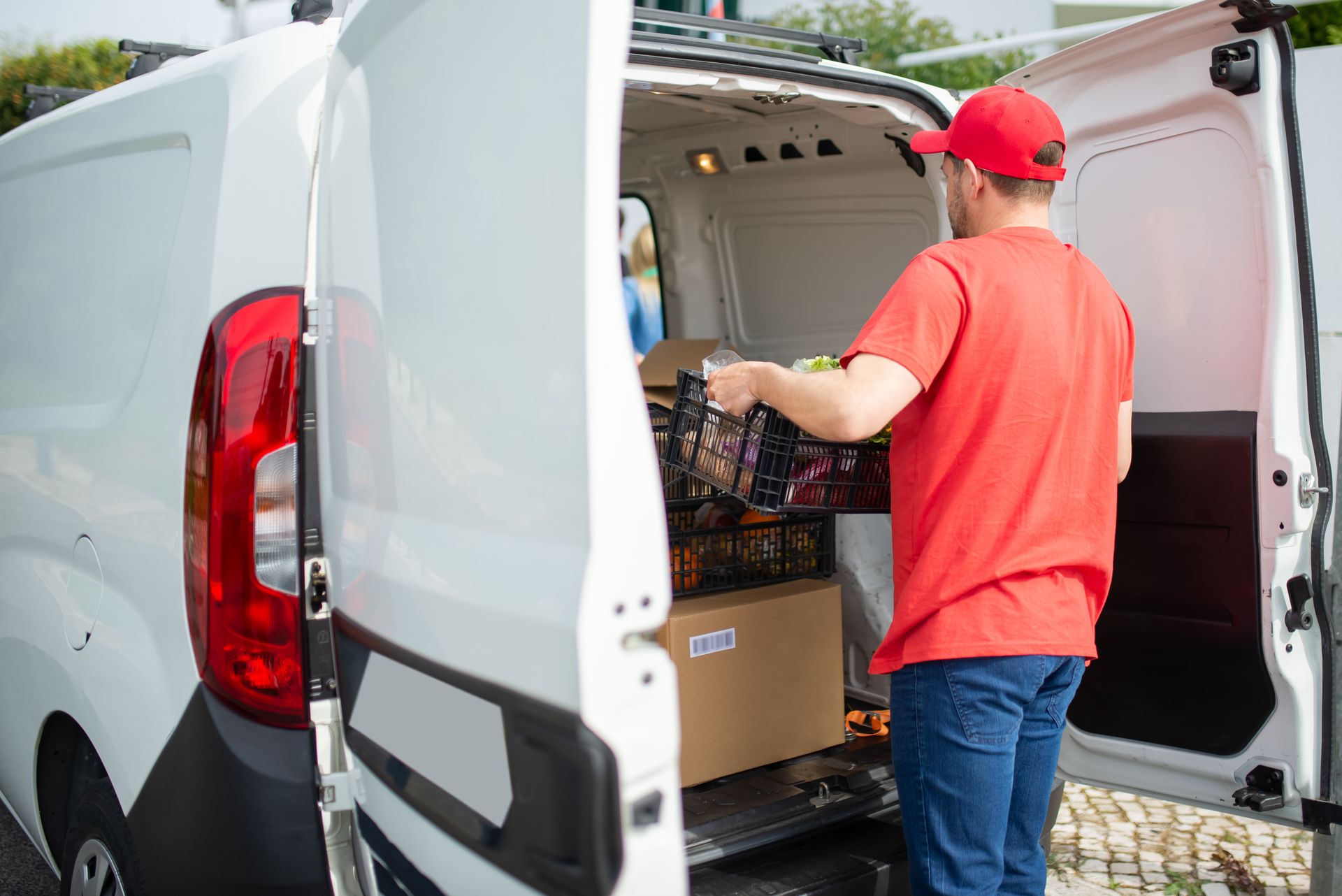 Service contractor with branded van loading equipment for a job site visit
