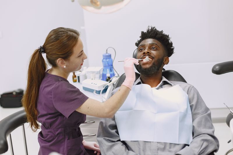 Dental examination in progress with modern equipment