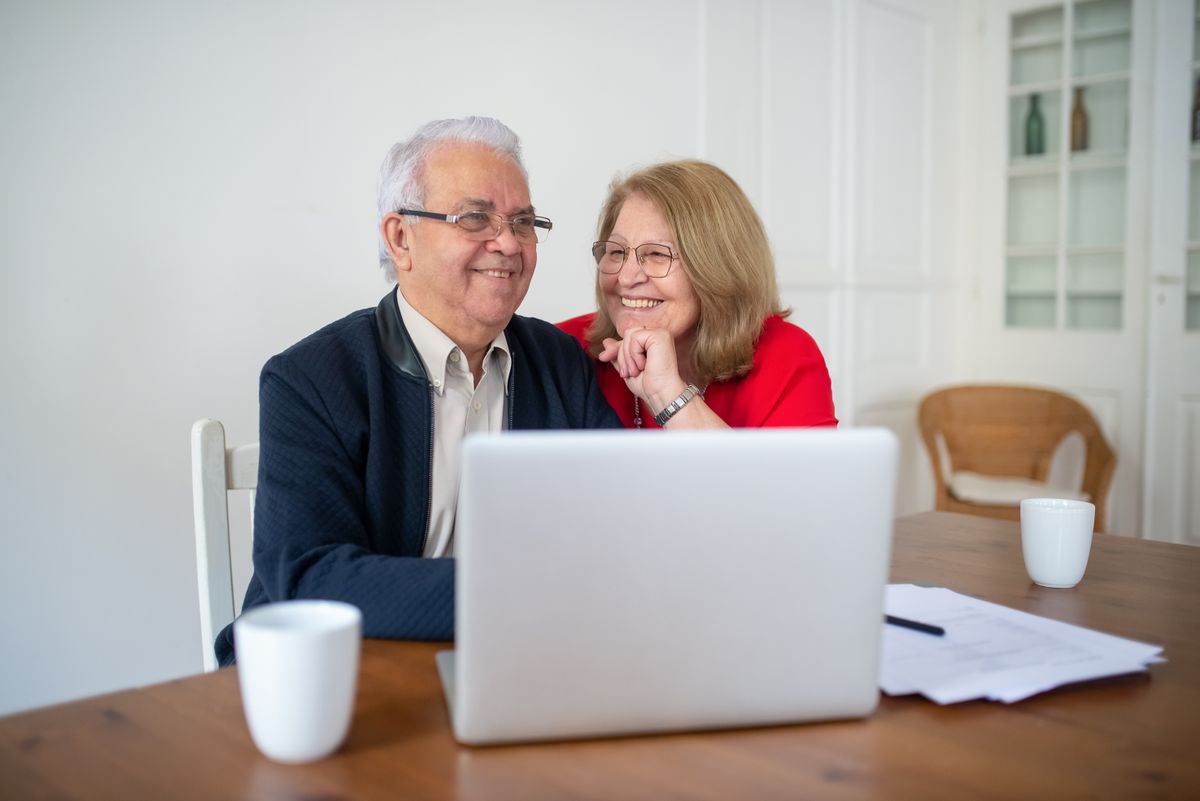 Family member consulting with a home care agency representative about senior care options