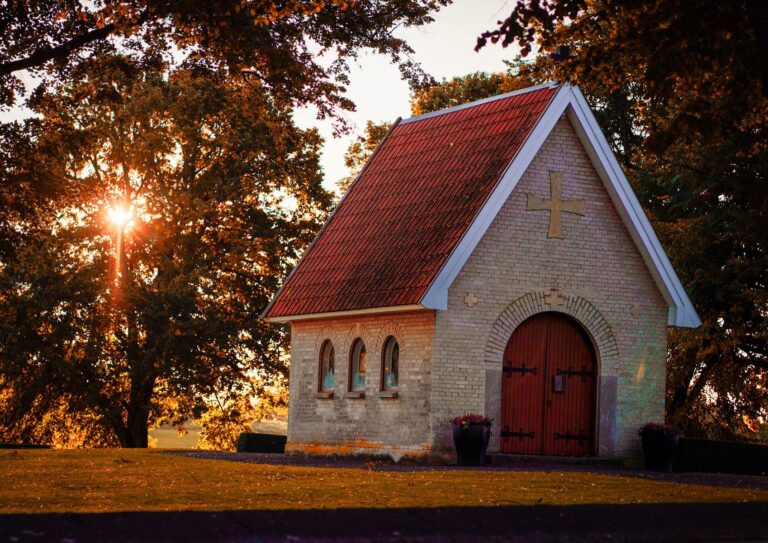 Stone chapel building at sunset, the kind of small funeral home families search for online