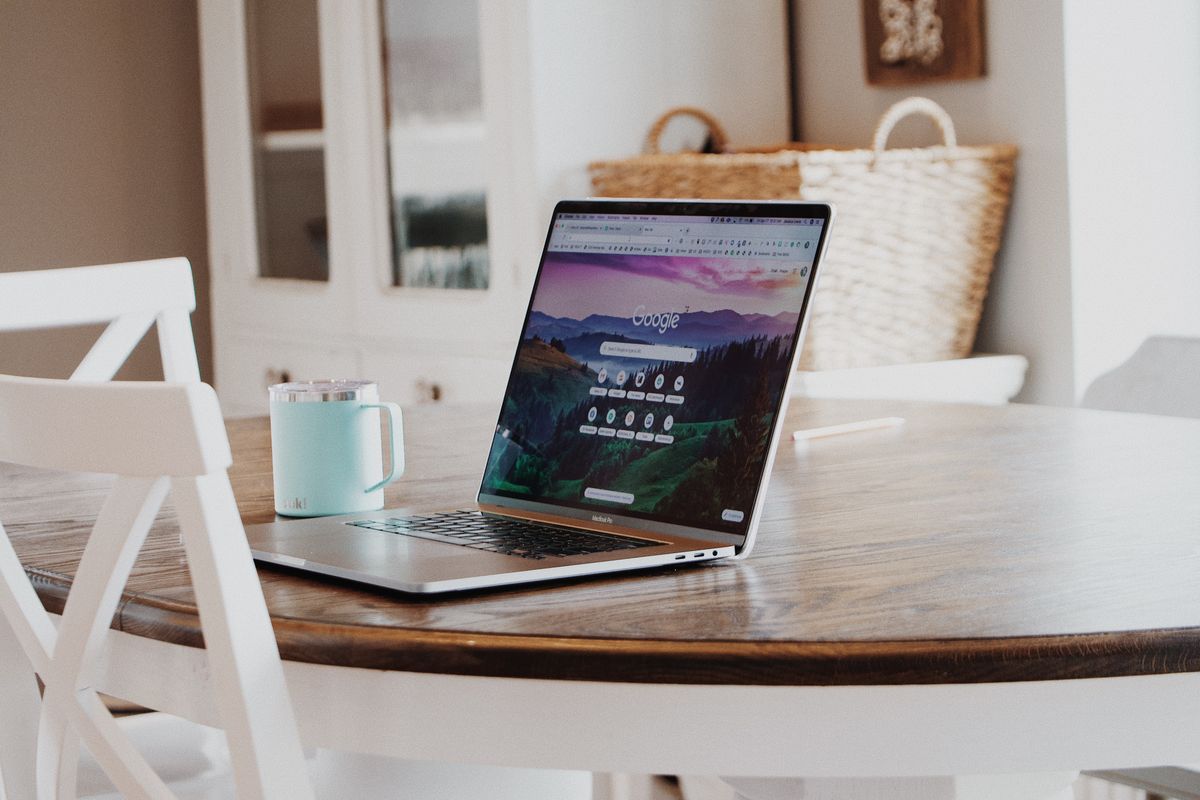 Home care agency owner reviewing SEO content strategy on laptop