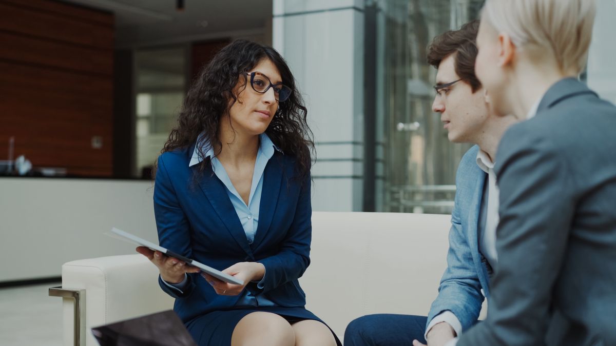 Business coach working one-on-one with a client during a coaching session