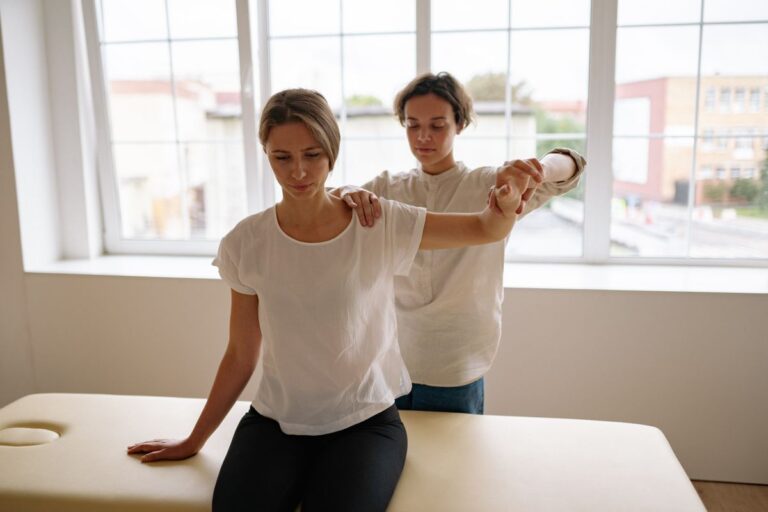 Physical therapy clinic with treatment tables and exercise equipment