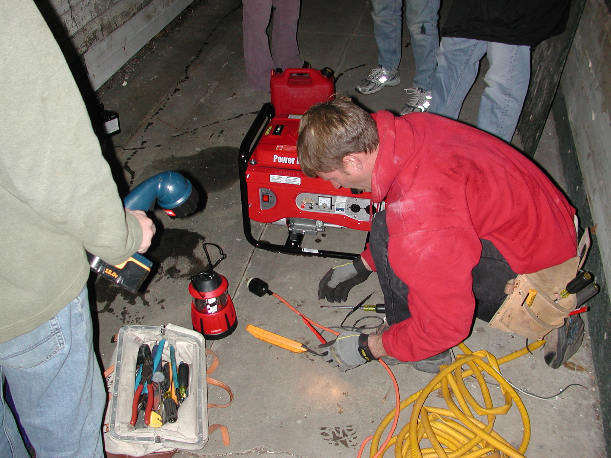electrician connecting generator to home electrical panel