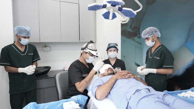 Medical team performing a hair transplant procedure in a clinic