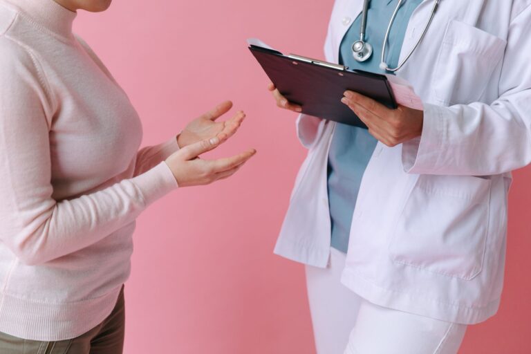 Doctor reviewing a patient's sleep study results during a consultation