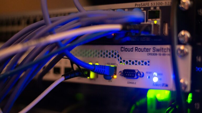 Ethernet network cables connected in a server rack at an IT support company