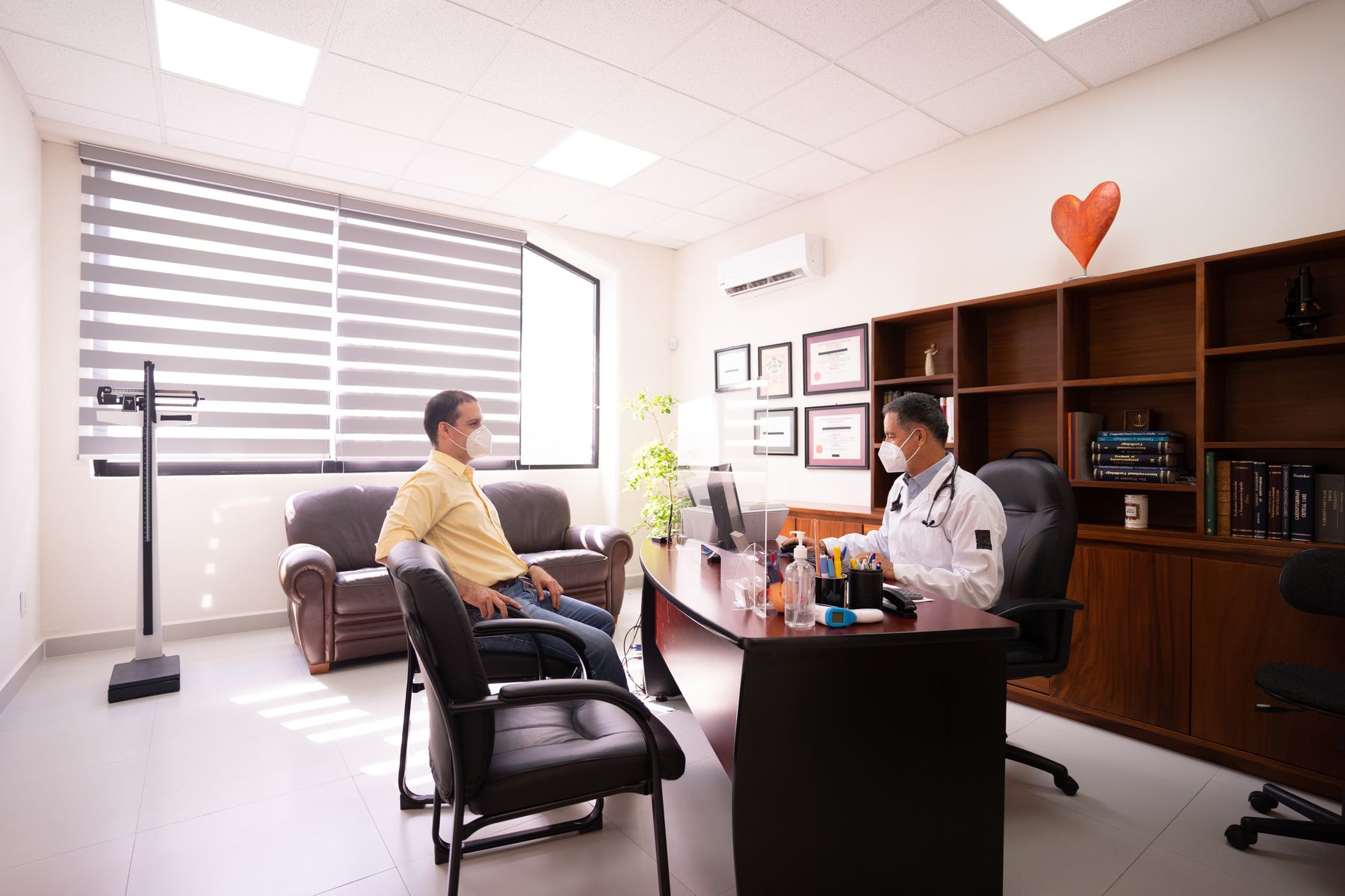 Doctor reviewing a patient's sleep study results during a consultation