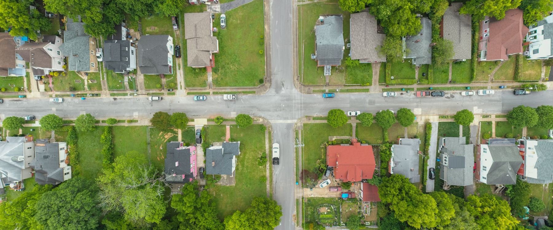 Aerial view of a suburban neighborhood with rows of houses