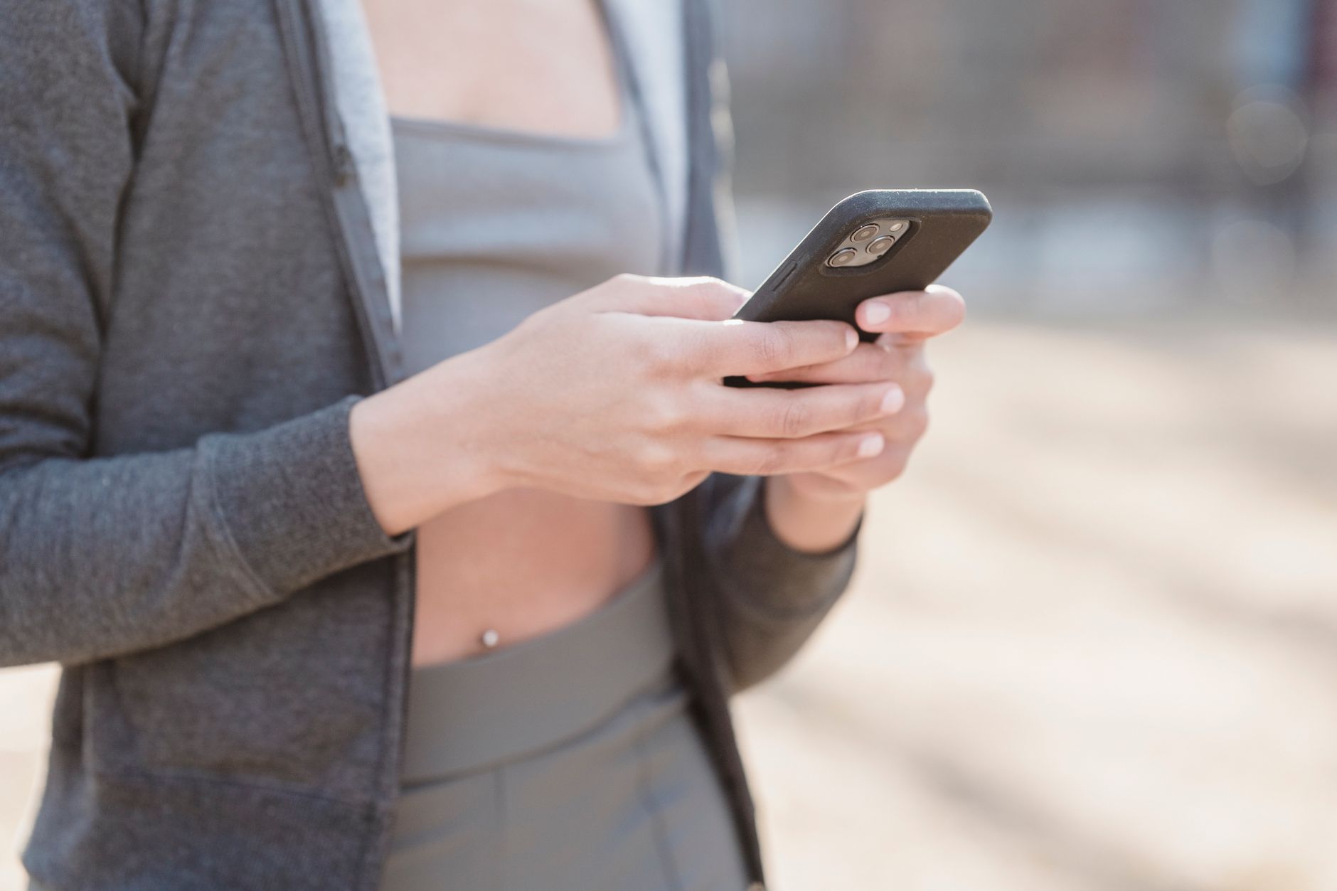 Person checking reviews and recommendations on a smartphone