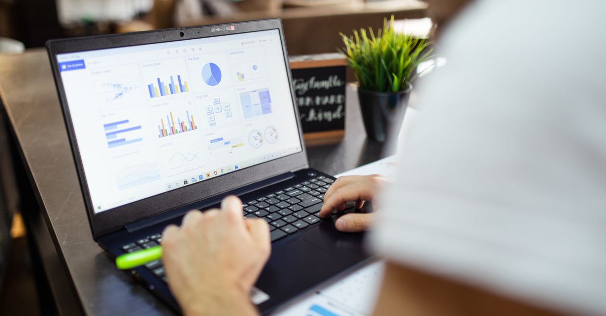 Local business owner comparing competitor keyword data on a spreadsheet