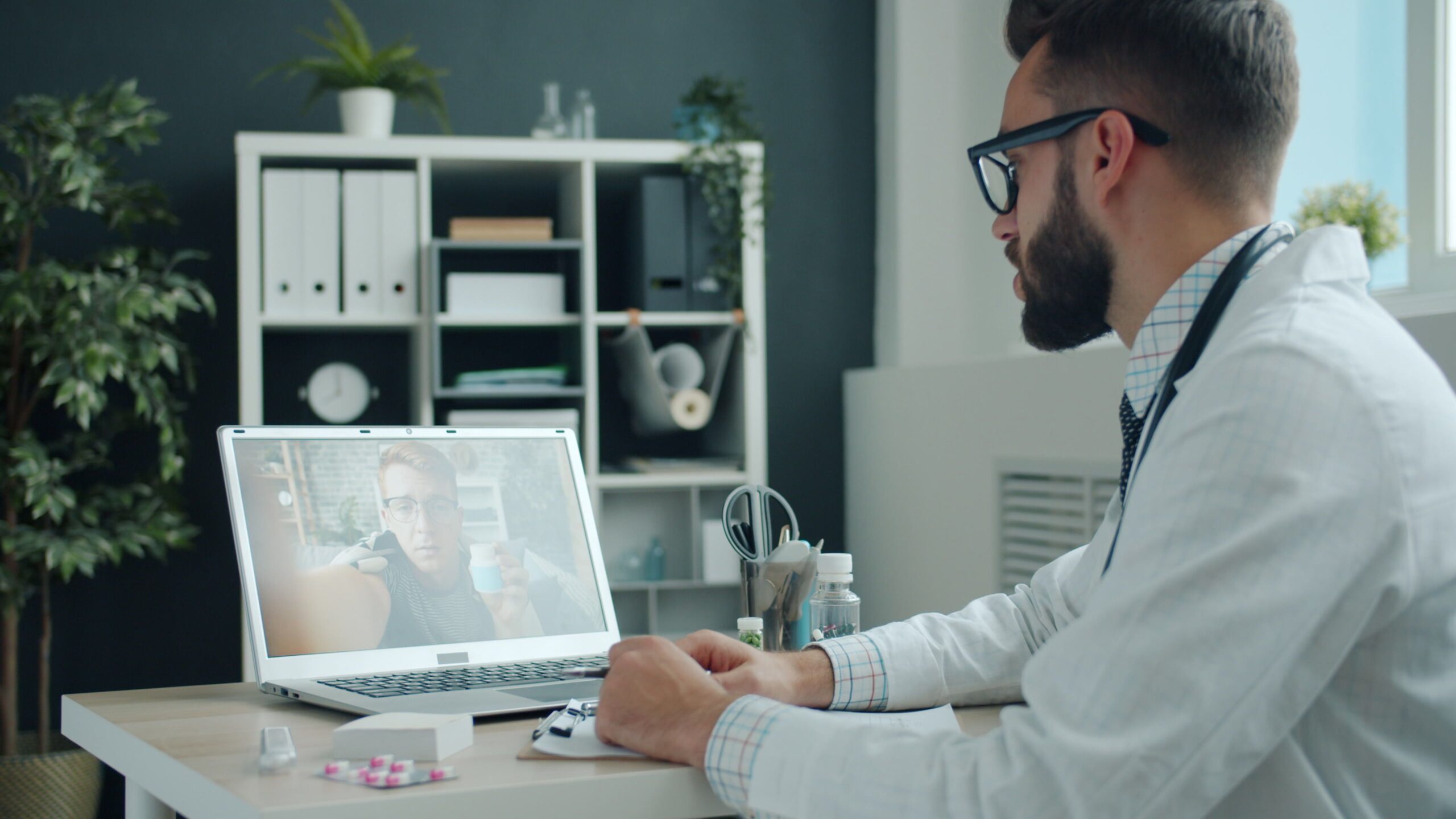 Doctor conducting a telehealth video consultation for a GLP-1 weight loss prescription
