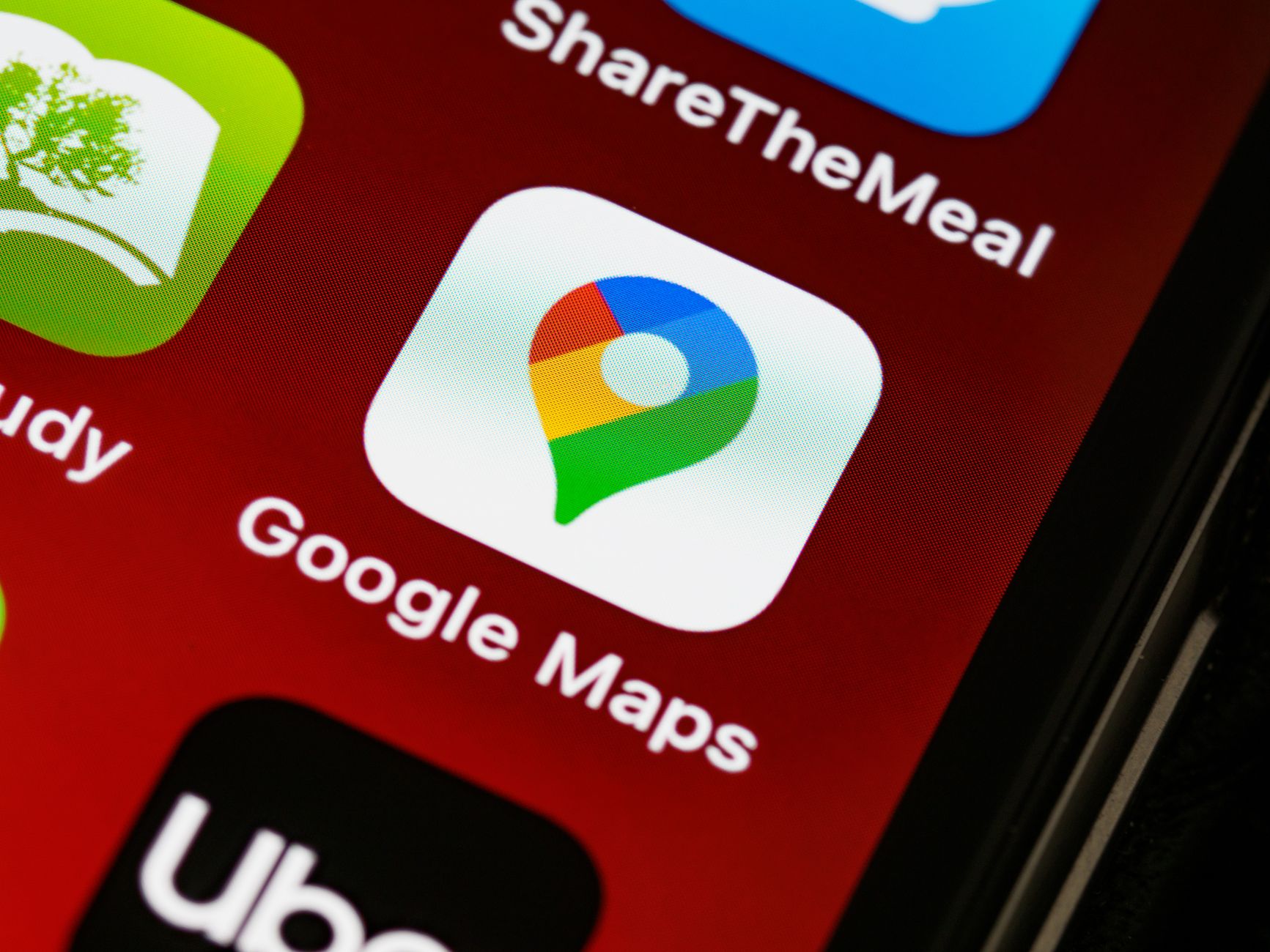 A smartphone screen showing the Google Maps app icon, the entry point to local map pack searches