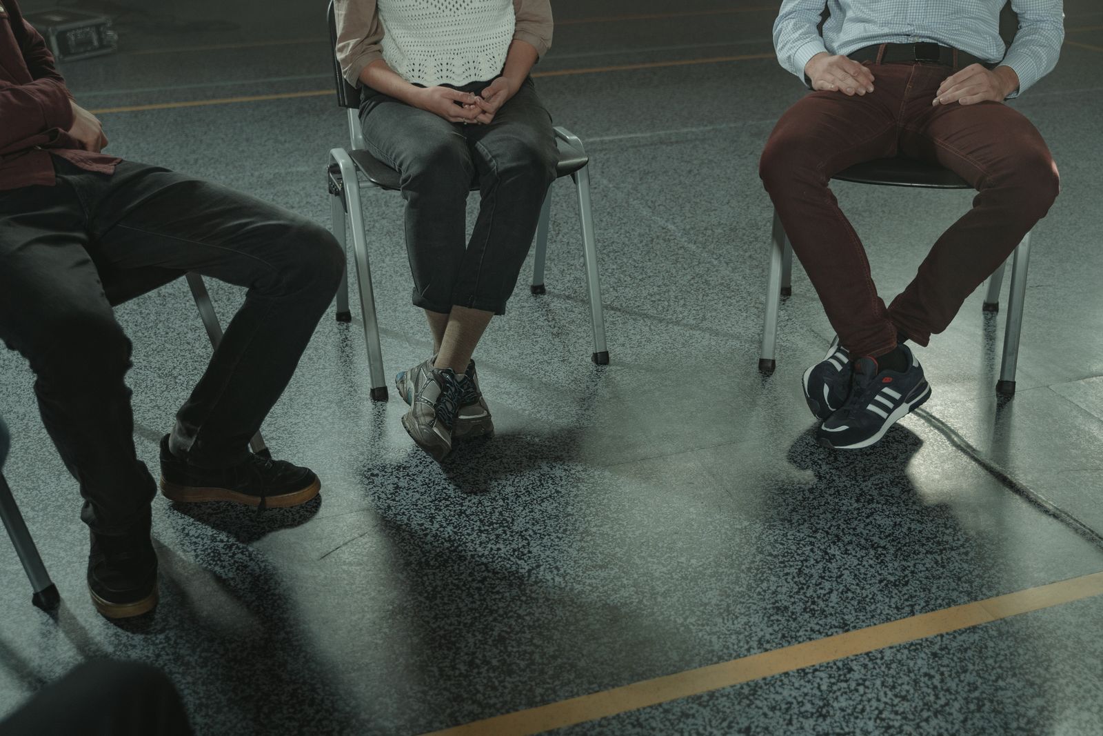 Small group sitting in a circle during a support group session
